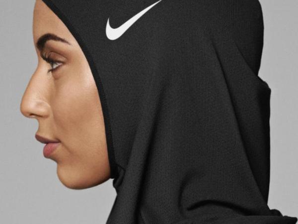 Profile pic of Ibtihaj Muhammad wearing hijab made of microfiber polyester and spandex and featuring a Nike swoosh logo