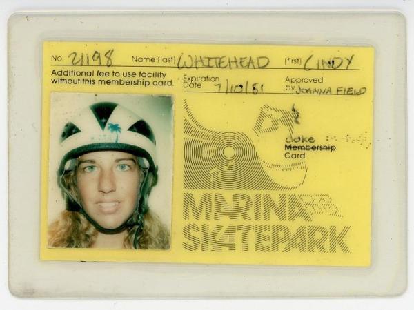 Yellow skate card with photo of Cindy Whitehead in a skate helmet on the left, her name and expiration date on top, and on the right the words: Marina Del Rey Skatepark