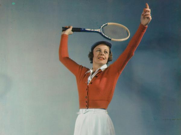 woman holding tennis racket 