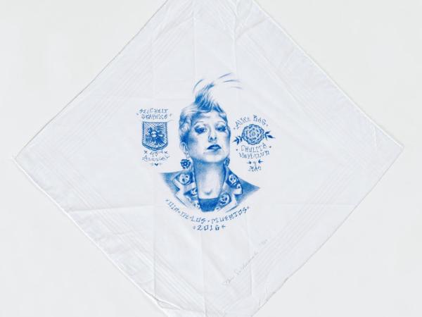 Detailed blue pen drawing of Alice Bag on a cotton paño (handkerchief)