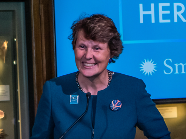 Stephanie Stebich, co-chair of the American Women’s History Initiative stands at a podium