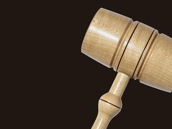 A gavel on a white background