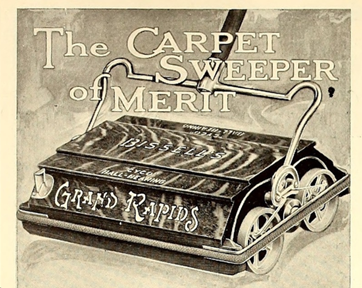 Print advertisement of a carpet sweeper with the words “The carpet sweeper of merit” and “Grand Rapids” printed on it. 