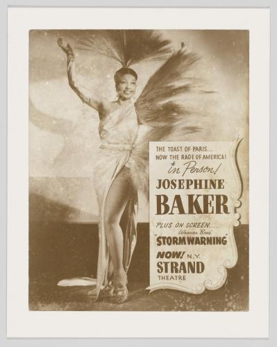 Poster of Josephine Baker advertising her performance at the Strand Theater. The poster features an image of Baker dressed in a long dress with feathers coming off the proper left side and wearing a hairpiece creating a fan of feathers behind her head