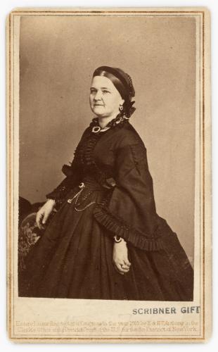 Black and white portrait photograph of Mary Todd Lincoln in a dark gown.