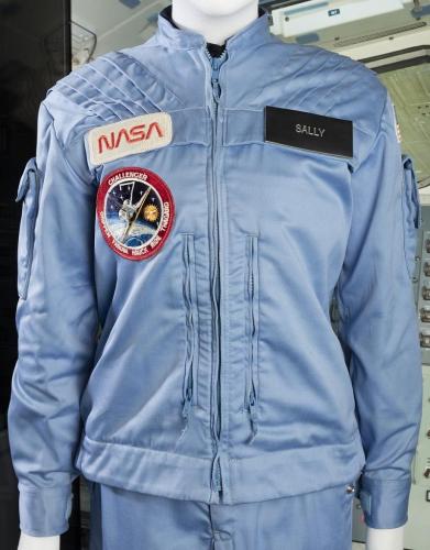 Light blue jacket with NASA patch, Shuttle Challenger patch, and name tag reading Sally