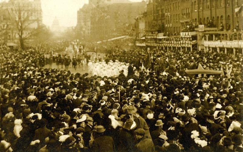 Crowd of people marching