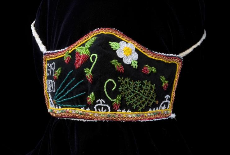 Face mask with beaded flowers and plants