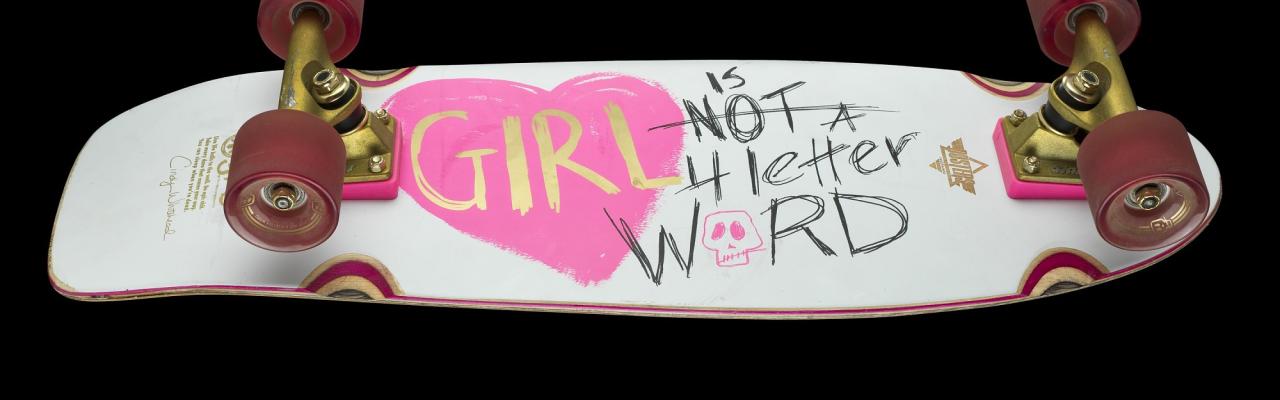  skateboard with pink heart and words girl is not a 4 letter word
